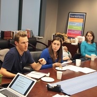 Participants in the 2015 Graduate Student Fellowship and Workshop discuss their research.